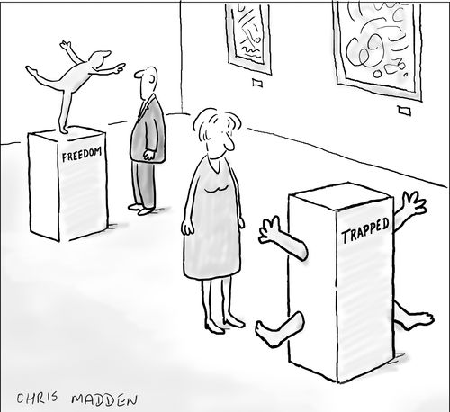Sculptures in an art gallery: one titled 'Freedom' and another titled 'Trapped'. 