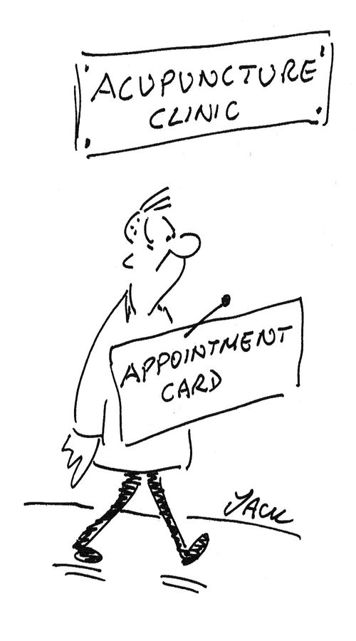 Acupuncture appointment card, pinned to chest.