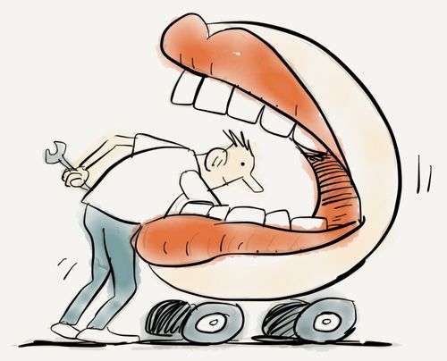 Dentist as car mechanic with mouth under the bonnet