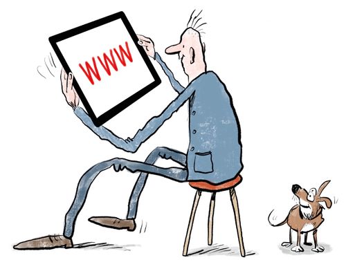 A man using a large tablet.