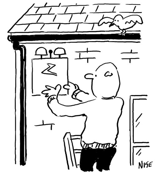 Man installing a burglar alarm,
