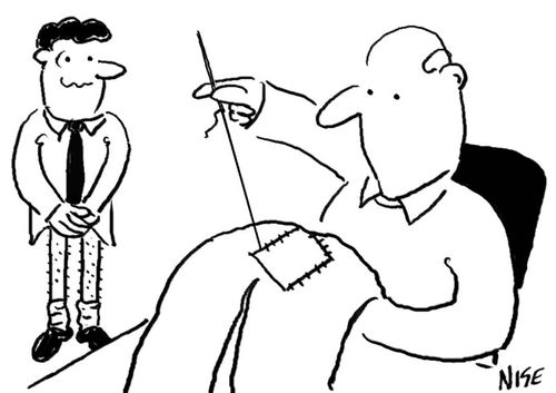 Man having trousers mended