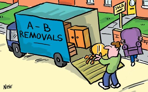 Removals van with men carrying furniture from a house