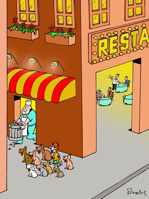 Restaurant scraps: Stray dogs and a street child waiting outside a restaurant for scraps.