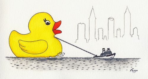 Tugboat pulls along a rubber duck.