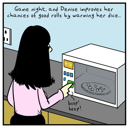 Game night, and Denise improves her chances of good rolls by warming her dice...