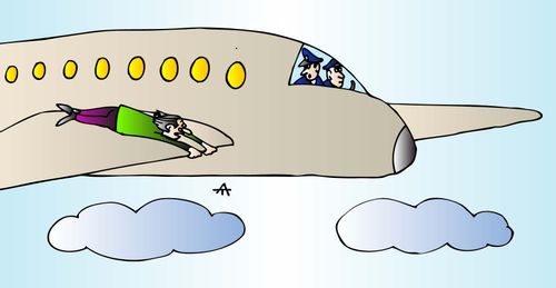 Man hangs on to the wing of a plane.