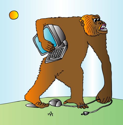 An ape holds a computer.