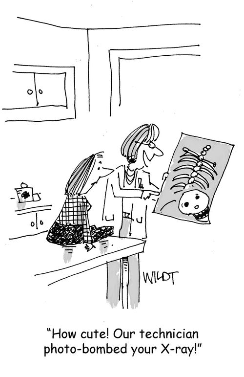 "How cute! Our technician photo-bombed your X-ray!"