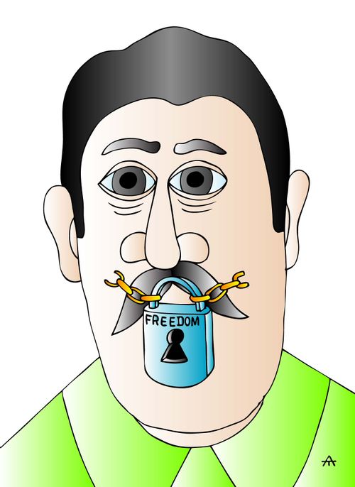 A lock labeled 'freedom' covers a man's mouth.