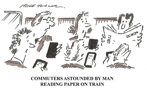 Commuters Astounded By Man Reading On Train