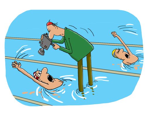 A man stands on a swimmer to film him.