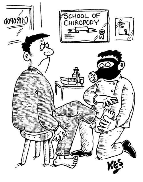 Chiropodist is wearing a gas mask while treating a client.