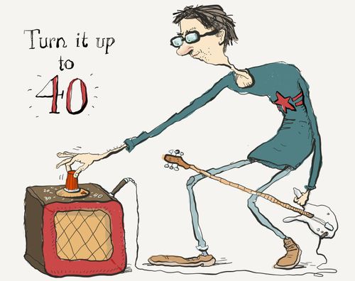 A guitarist turning amp up to 40