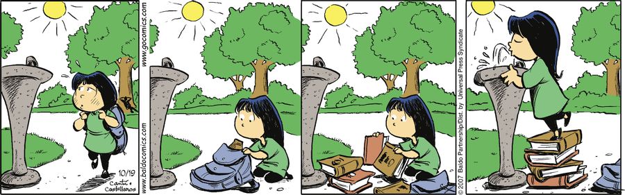 Gracie uses her books to drink water from a fountain.