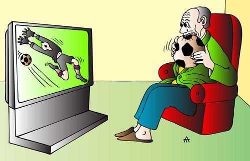 A football fan chews a football as his team concedes.