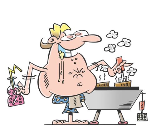 Man roasting steaks on the grill