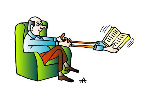 A man uses a reaching tool to keep a book far enough out for him to read it.