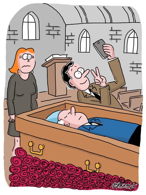 Mourner taking selfie with deceased 