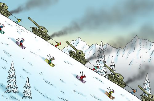 Tanks pulling skiers up a slope.