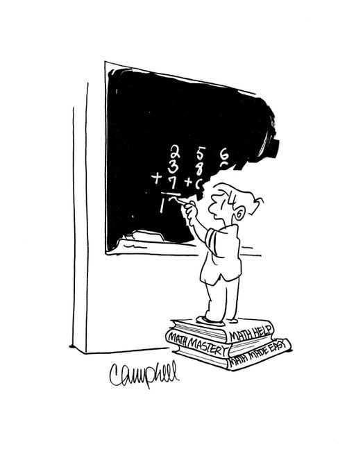 Child stands on Math help books to reach blackboard.
