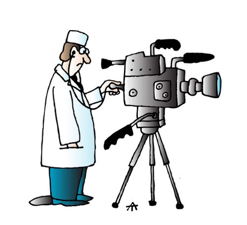 Doctor fixing a camera