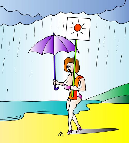 Woman at the beach wishes for sunshine.