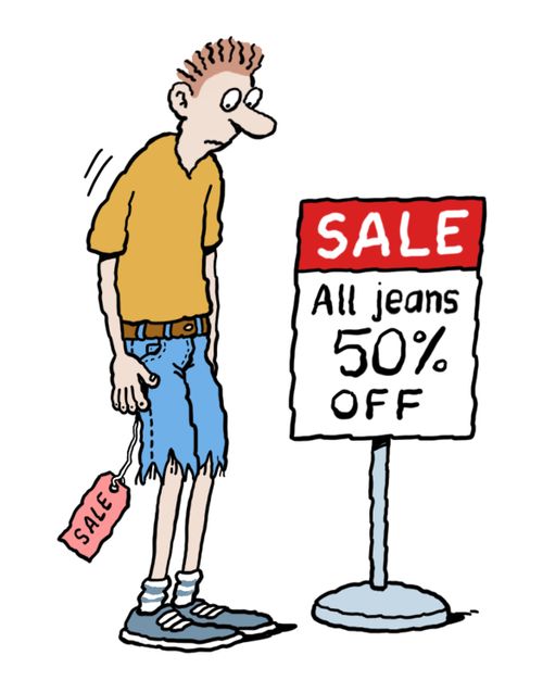 Man with cut off jeans next to 50% off sign