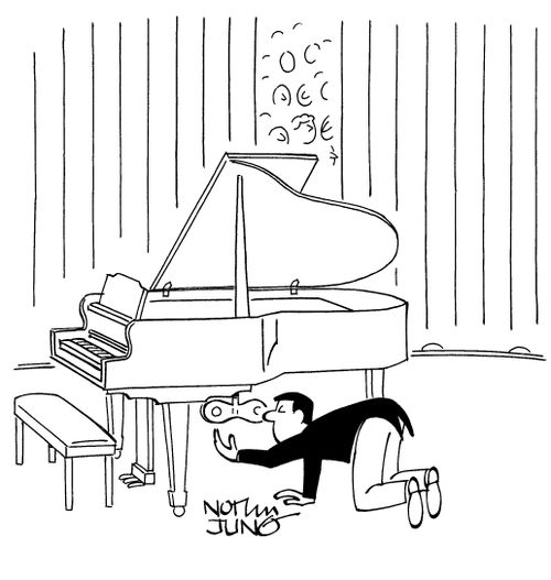 Pianist winds key to his piano before concert.