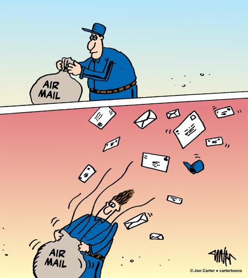 A postal worker opens a bag of air mail.