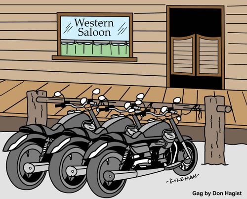 Motorcycles tied to hitching post outside a western saloon