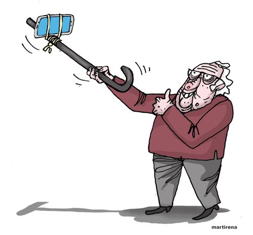 Elderly man with a selfie stick