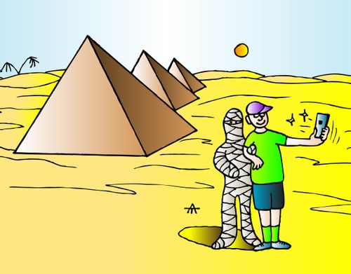 A man takes a selfie with an Egyptian mummy