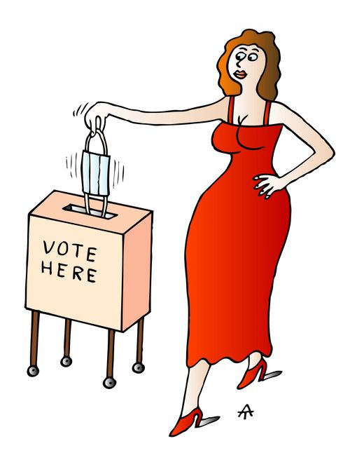 Lady votes using her facemask.
