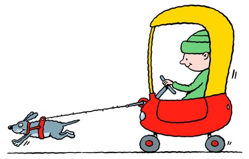 Child in toy car being pulled by a dog 