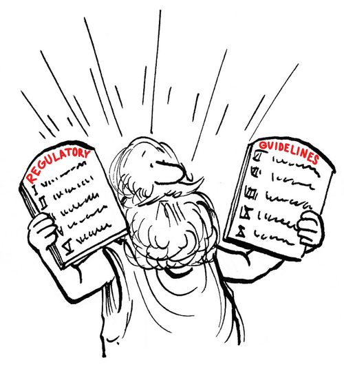 Moses holds up new federal regulation guidelines.