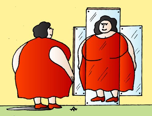 Woman looking into a mirror