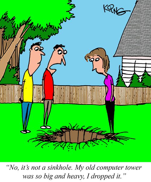 "No, it's not a sinkhole. My old computer tower was so big and heavy, I dropped it."
