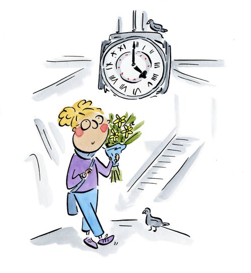 Woman walks past Waterloo station clock.
