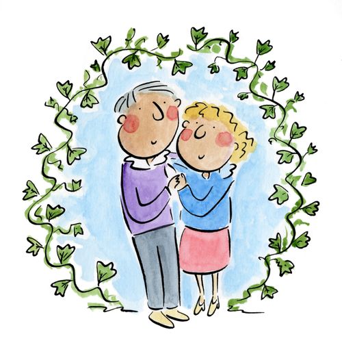 Man and woman surrounded by ivy.
