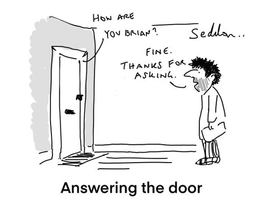Answering the door.