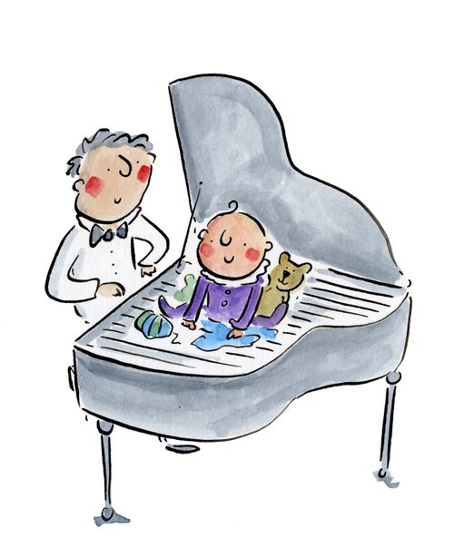 A baby playing on a grand piano