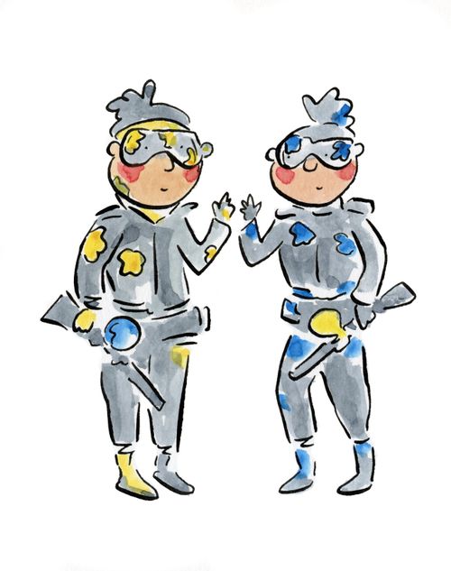 Two people paintballing 