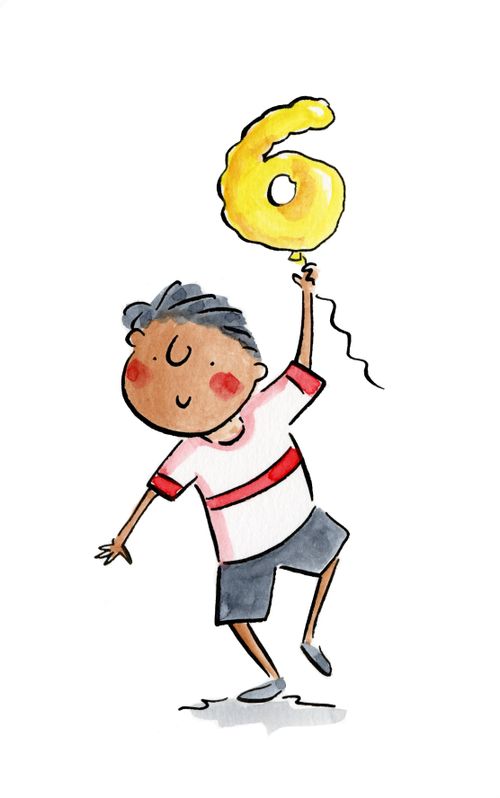 A boy holding a balloon shaped like a '6'