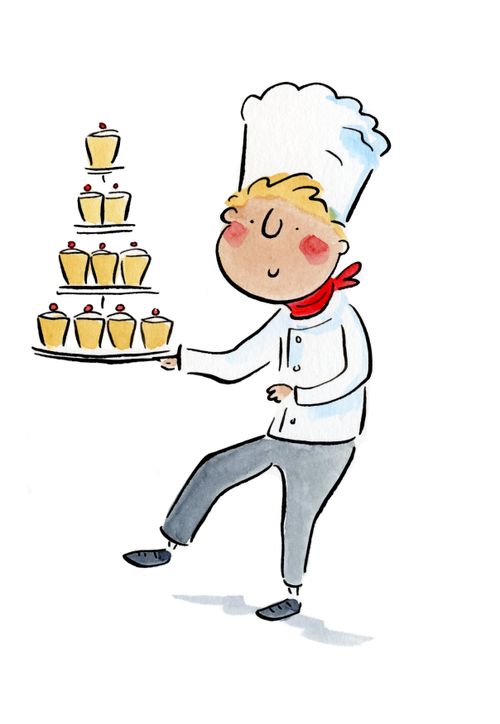 A chef with a platter of cakes