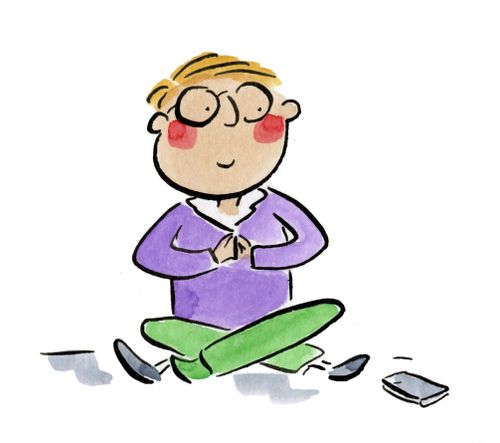 A meditating man glancing at his phone