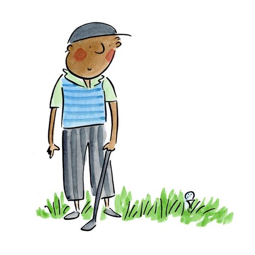 A man holding a golf club eying up his shot