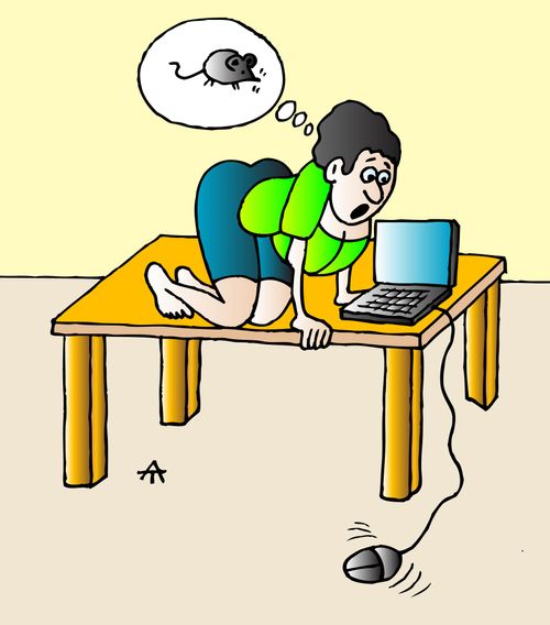 Woman afraid of a computer mouse.