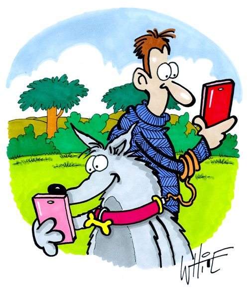 A man and his dog glued to their phones