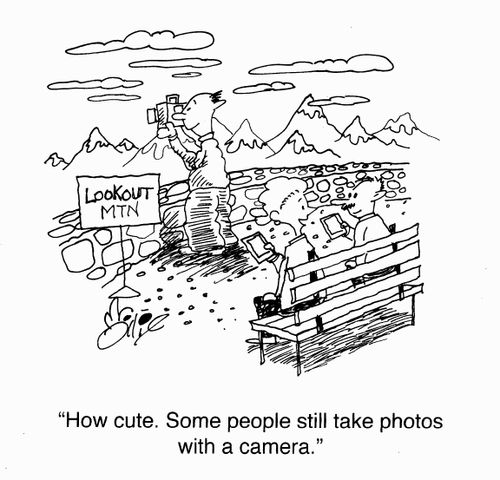 "How cute. Some people still take photos with a camera."